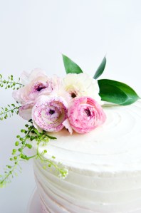 ranunculus flowers on cake